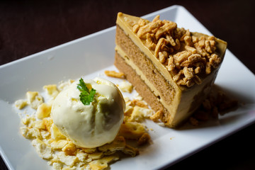 Coffee cake with vanilla ice cream.