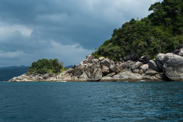 Obraz premium Rocky coast of tropical island