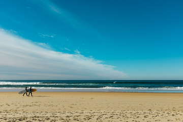 Fototapeta na wymiar Two Surfer at the beach