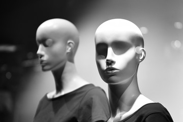 Black and white photo of busts of mannequins. - obrazy, fototapety, plakaty