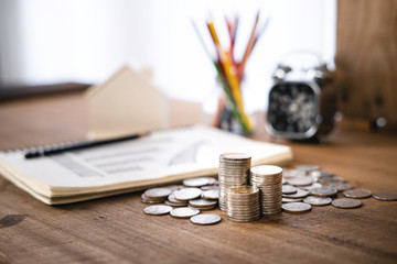Money growing concept-Money and income graph drawing On Home office desk