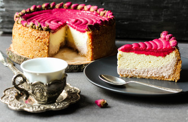 Piece of raspberry cheesecake. Natural home baking.