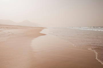 Beach landscape -  Cofete, Fuerteventura, Canary Islands. Perfect place for the coast lovers. Tourist holiday destination, background, copy space.