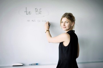 blonde teacher teaching a lesson