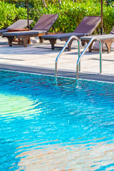 Stair around outdoor swimming pool in hotel resort