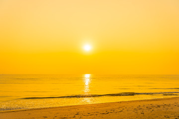 Beautiful tropical sea ocean beach at sunrise or sunset time
