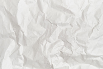 The background and texture of white crumpled paper.