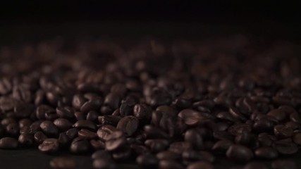 Falling coffee beans,Close up of seeds of coffee. Beautiful seeds of coffee.
