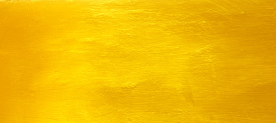 Naklejka premium Golden cement wall background
