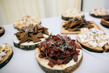  Buffet with meat appetizers at restaurant, catering