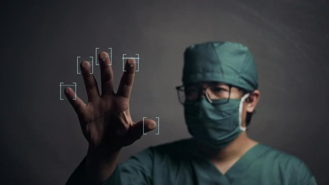Surgeon Accessing Brain Patient Data by Finger Print. Future Medical Concept.