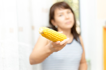 Girl eats corn