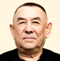 Portrait of an attractive man age with short hair.