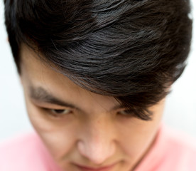 Obraz premium Portrait of a handsome Asian guy