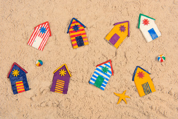 Beach huts in the sand