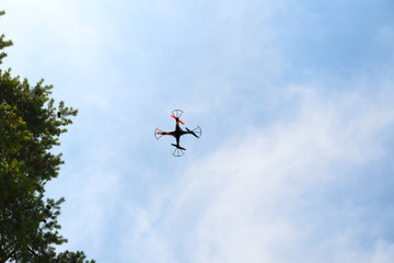 Fototapeta na wymiar Flying drone in air