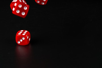 Group of dice close up on dark black background