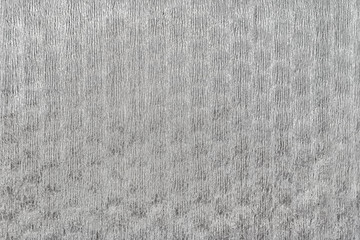 Fototapeta na wymiar abstract background of gray knit fabric close up