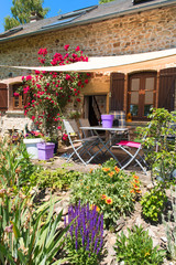 Fototapeta na wymiar Romantic house with garden in France