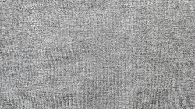 abstract background of old grey knit fabric close up