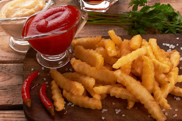 french fries on wooden table