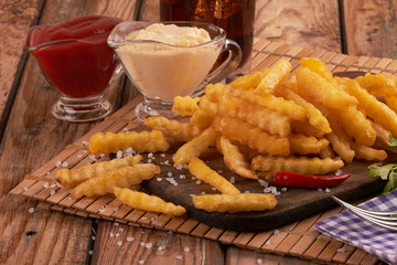 french fries on wooden table