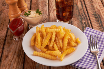 french fries on wooden table