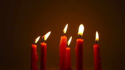 candles on black background