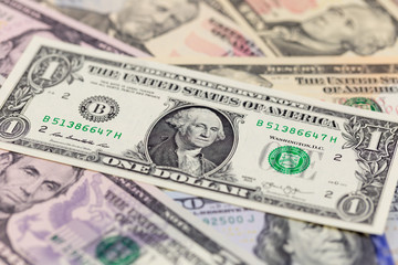 One dollar bill on american banknotes, business background