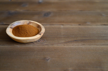 chaga tea mushroom from birch tree using for healing tea or coffee in folk medicine. ground powder