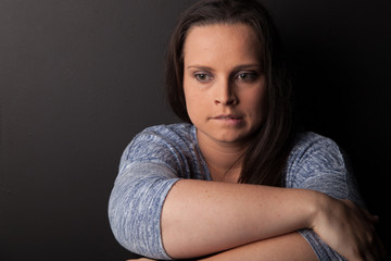 Female biting lip with anxiety and nervous with copy space