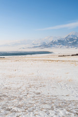 China Xinjiang Sayram Lake(sailimu hu) in winter. Climate and travel concept.