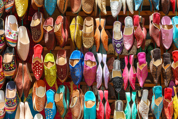 Multicolored traditional handmade shoes at the Moroccan oriental bazaar