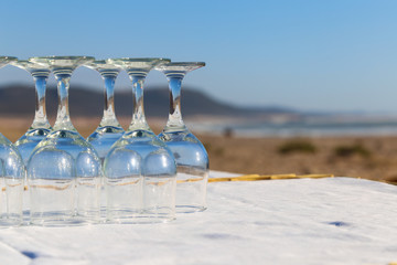 Glasses served for a banquet on the beach