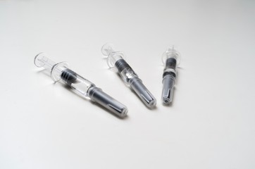 Generic prefilled vaccine syringes. Close-up studio shot.