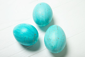 Blue Easter eggs with gold splashes