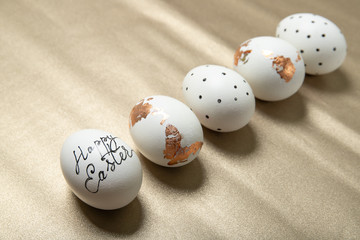 Easter eggs on a gold background.