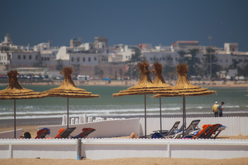 Essaouira beach with straw umbrellas
