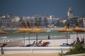 Essaouira beach with straw umbrellas