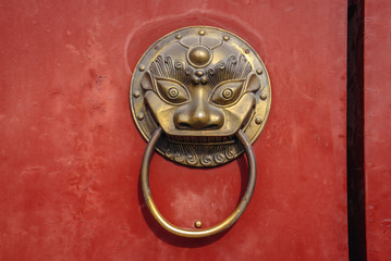 Details of traditional Chinese door in Jingshan Park, former private imperial park in Beijing,...