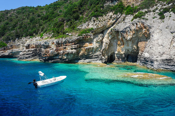 A lonely boat in Paxos Island sea.