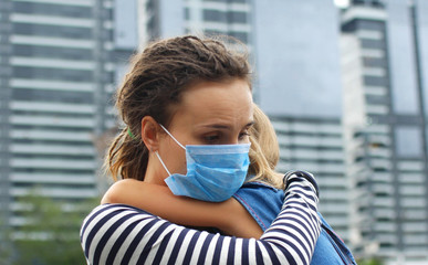 Parent hugs the child. Fighting the 2019-nCoV Virus Outbreak