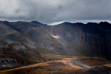 Fototapeta premium beautiful landscape in the highlands, textural hills with incident light.
