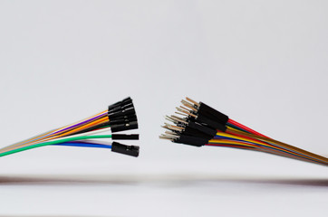 connection of colored wires on a white background