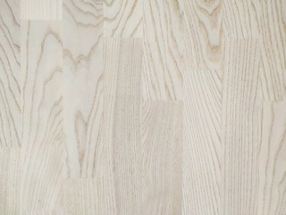 Wooden background made of natural wood with pattern of lines and knot for wallpaper in beige color used in carpentry and flooring