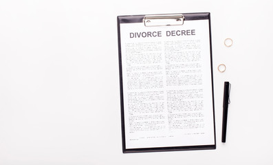 Divorce decree and pen isolated on white