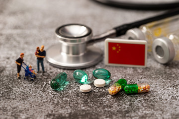 China flag with miniature and medicine 