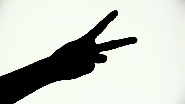 Set of hand gestures. Body language. Black and white shot, close-up, and isolated footage. Silhouette of a hand counting using three fingers. Alpha matte. Hand symbols. Contrast shot. Handshake.