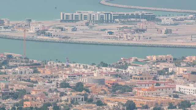 Aerial view of Dubai man made Daria Island, Dubai, United Arab Emirates. Evening view from above