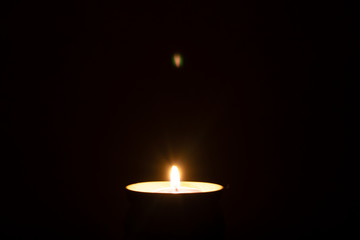 Abstract flame of a candle in the dark